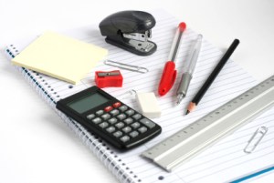 notepad calculator ruler pens pencil stapler