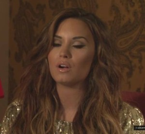 demi gold tone hair and makeup