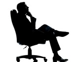 14354763-one-caucasian-business-man-relaxing-thinking-sitting-in-armchair-silhouette-full-length-in-studio-is