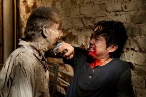 Glenn (Steven Yeun) and Walker - The Walking Dead - Season 3, Episode 7 - Photo Credit: Gene Page/AMC